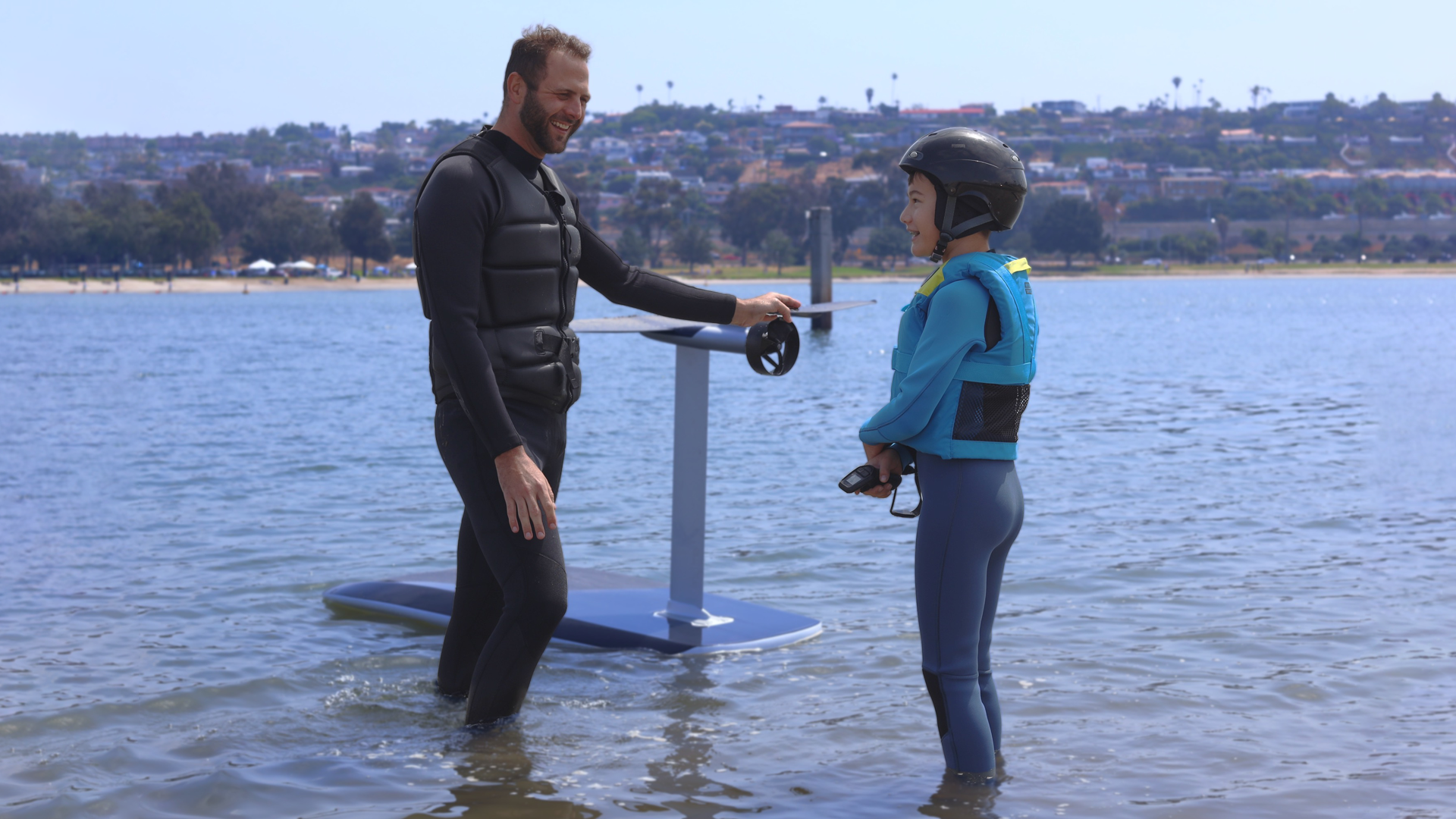 E-foil lesson mission bay San Diego Electric surfboard Electric foil board SENDIT 10 year old learns to efoil in mission bay San Diego 